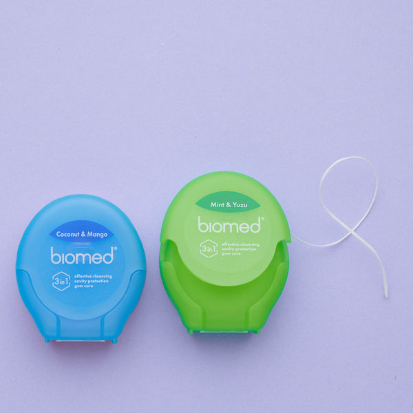 BIOMED dental floss with Coconut and Mango flavor - twentyfiveoseven Limited